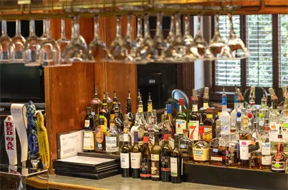 Image: Bar with glasses and liquor bottles